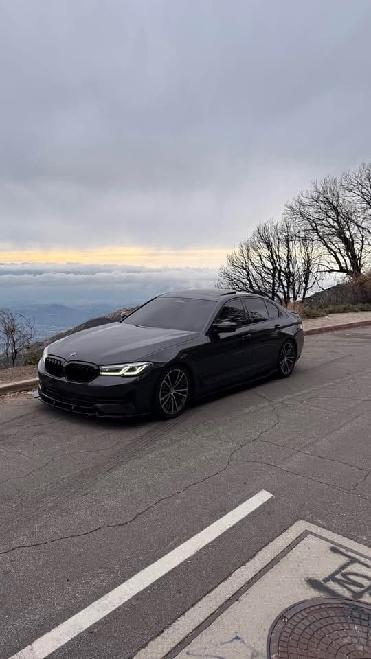 Gray BMW 530i parked outside